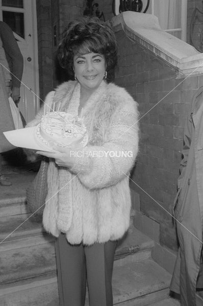 Elizabeth Taylor Presented with a Birthday Cake, Cheyne Gardens, Chelsea, London, 1982