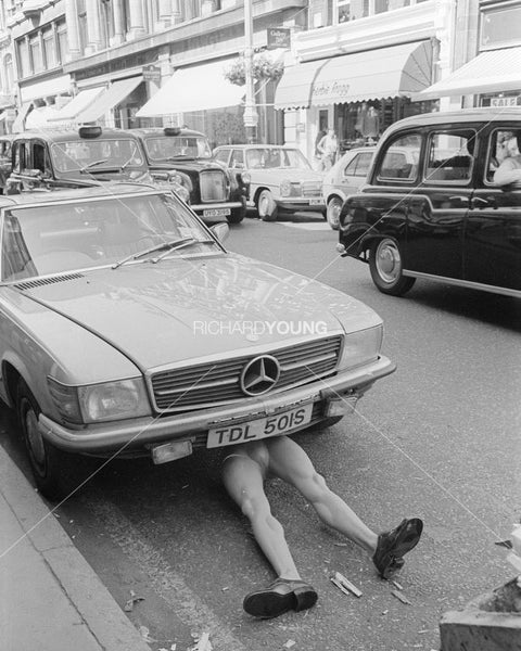 Car with Legs on Bond Street, London, 1981