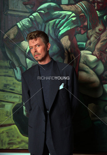 David Bowie with a Painting by Peter Howson, London, 1994