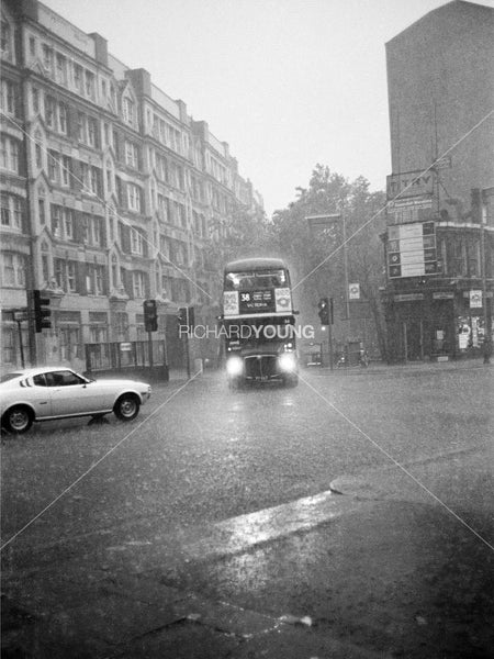 Double Decker Bus in Storm, London, 1981